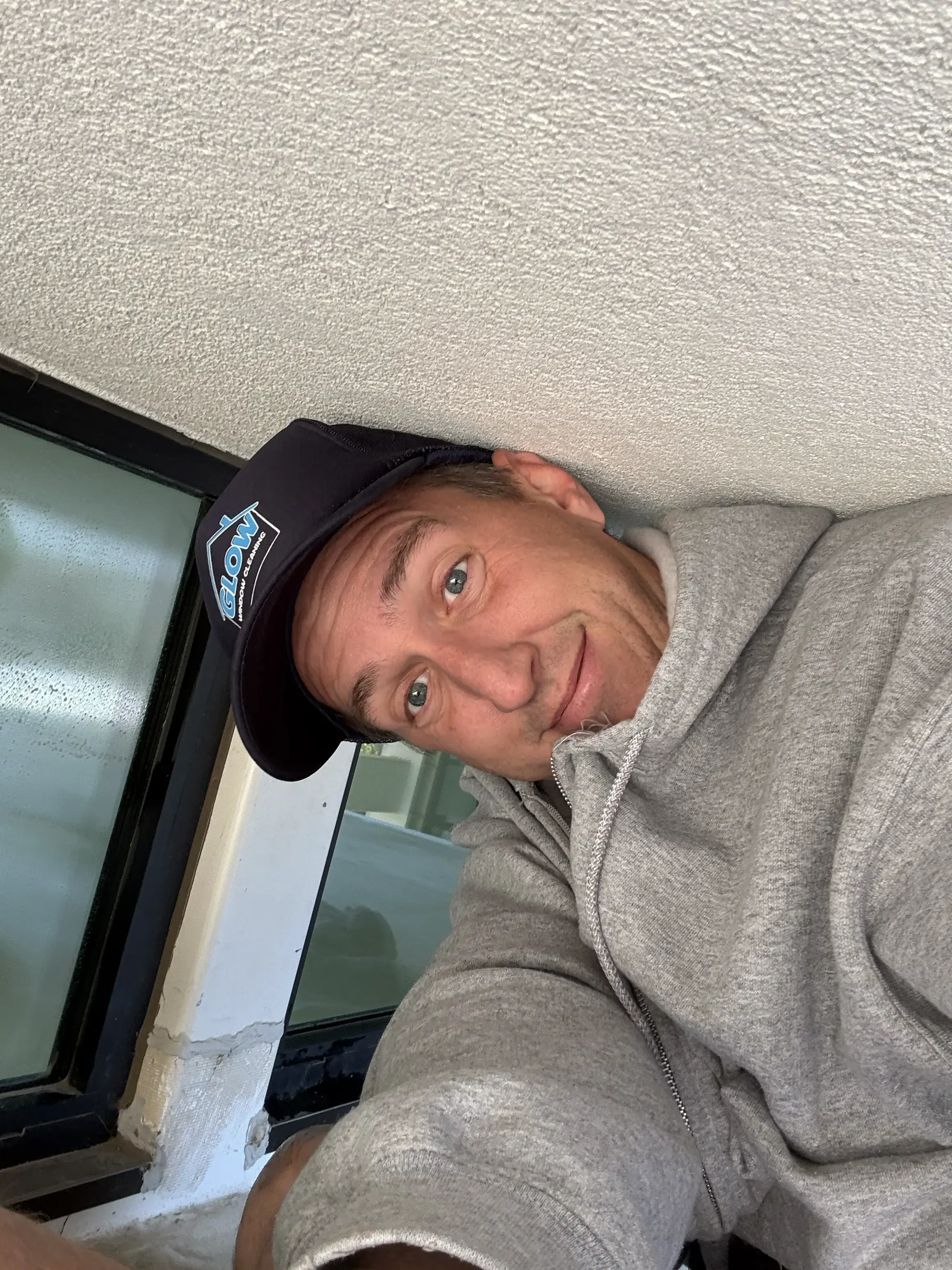 Chris Schacter, the founder of Glow Window Cleaning, being a derp.