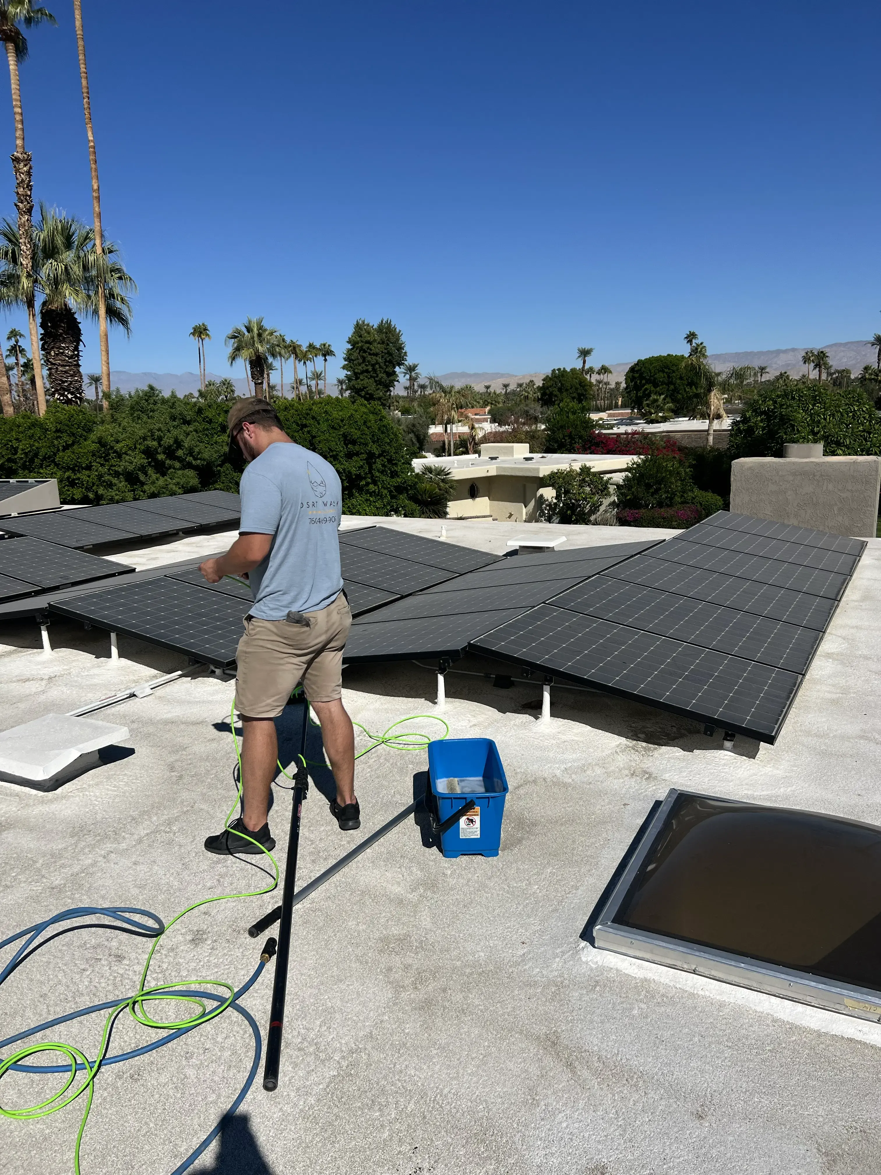 Close-up of clean solar panels glinting under the desert sun.