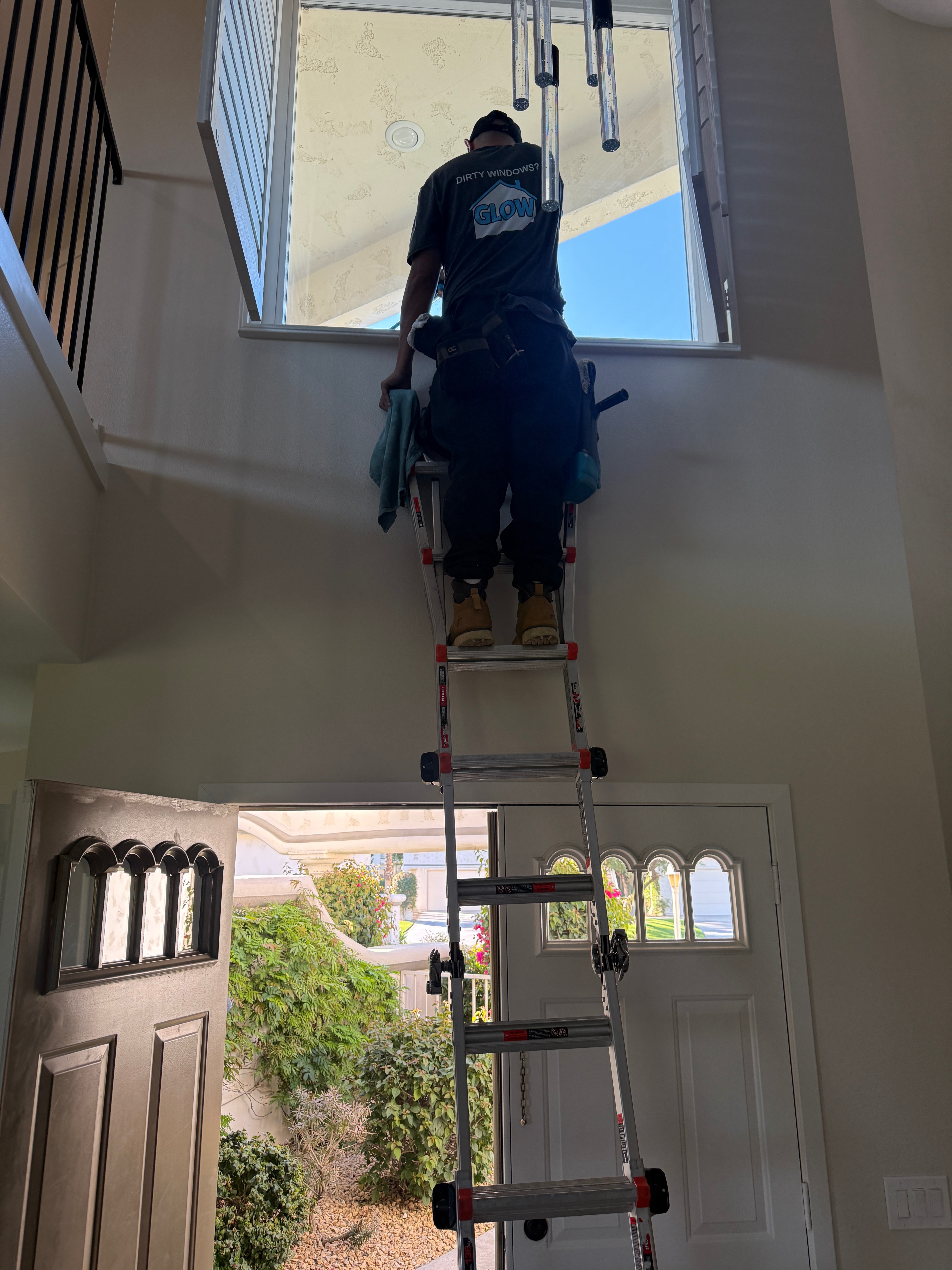 High window cleaning in entryway