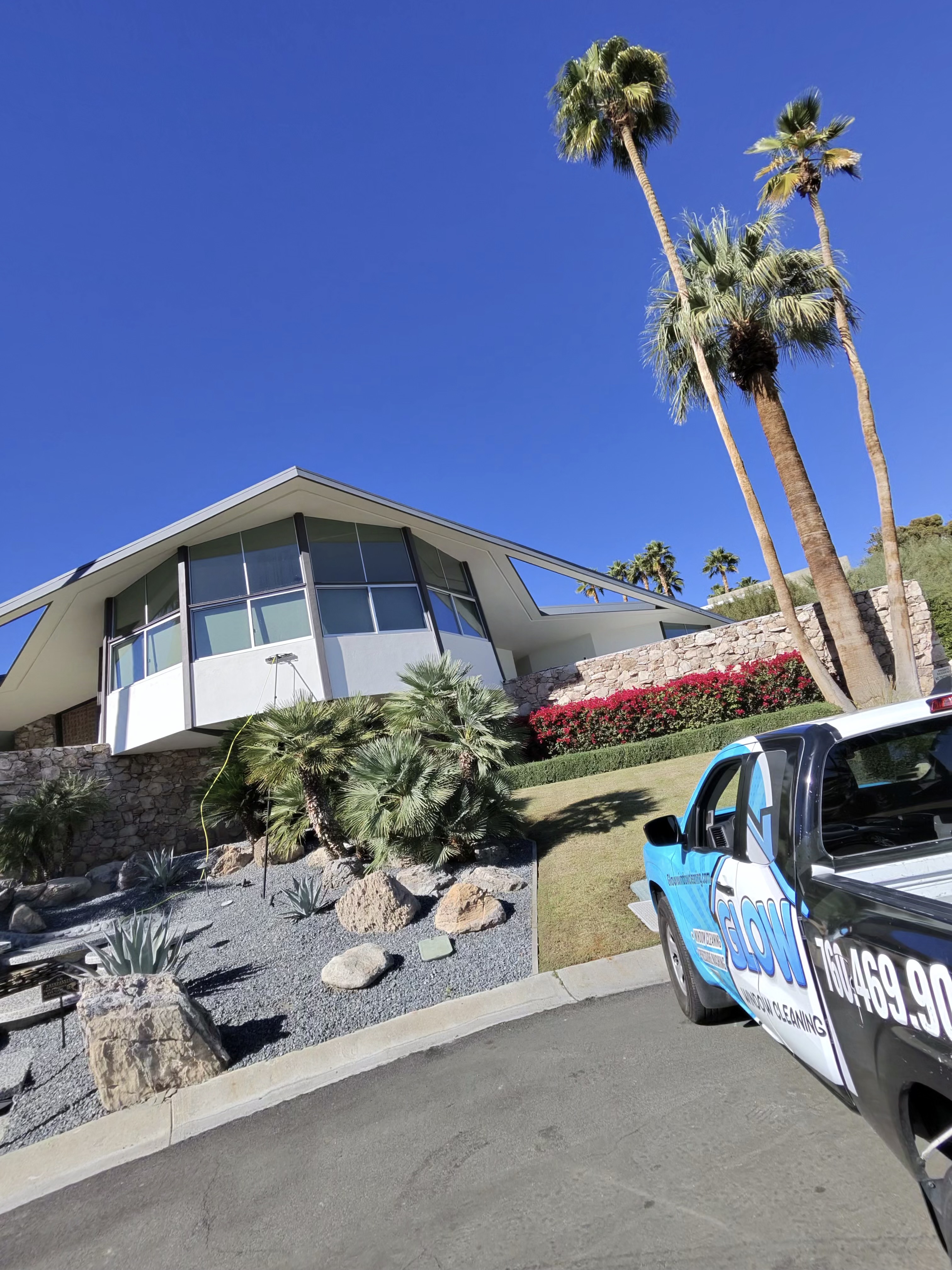 Glow Window Cleaning truck at a Palm Springs mid-century modern home