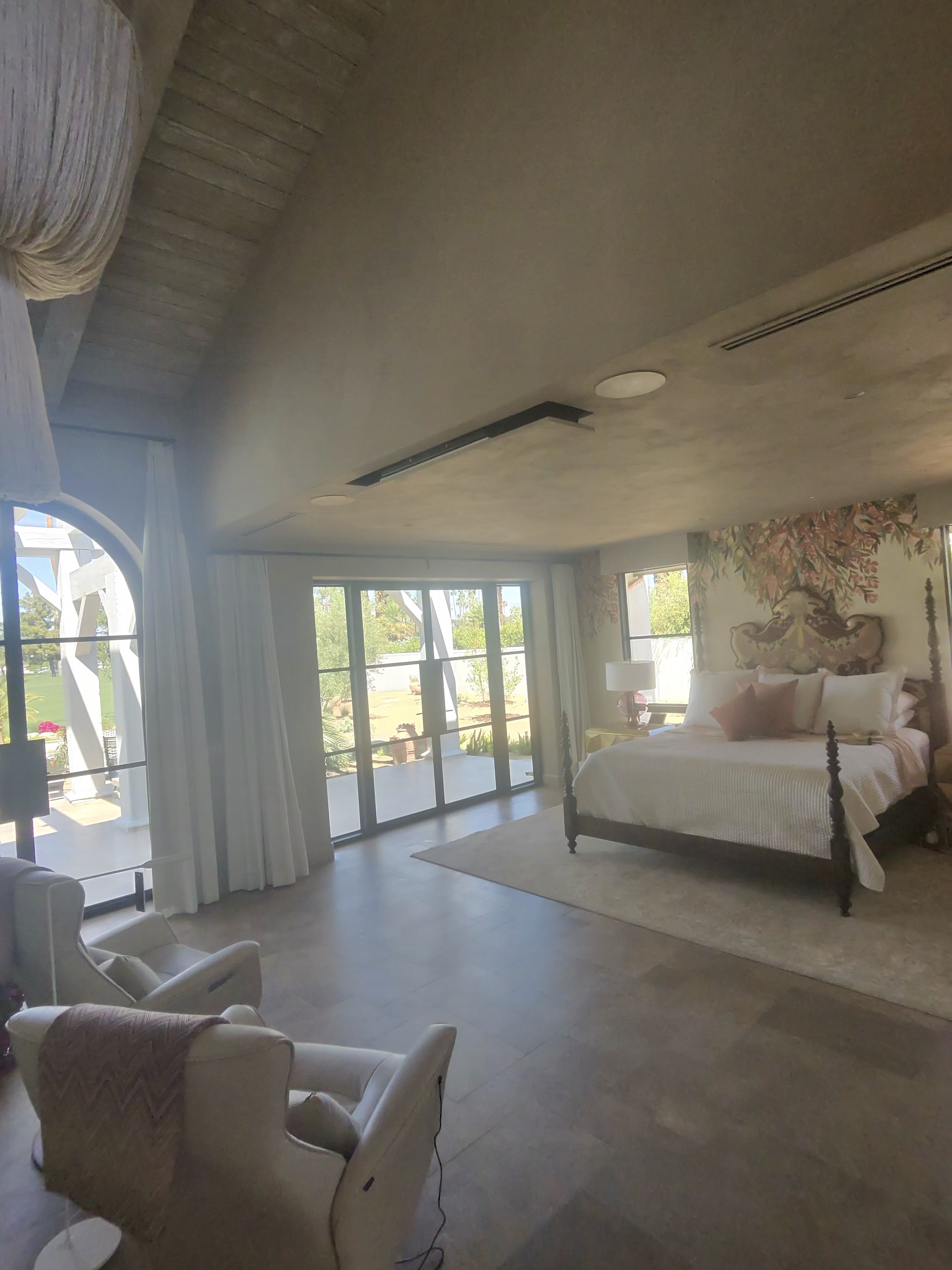 Elegant bedroom with sparkling windows